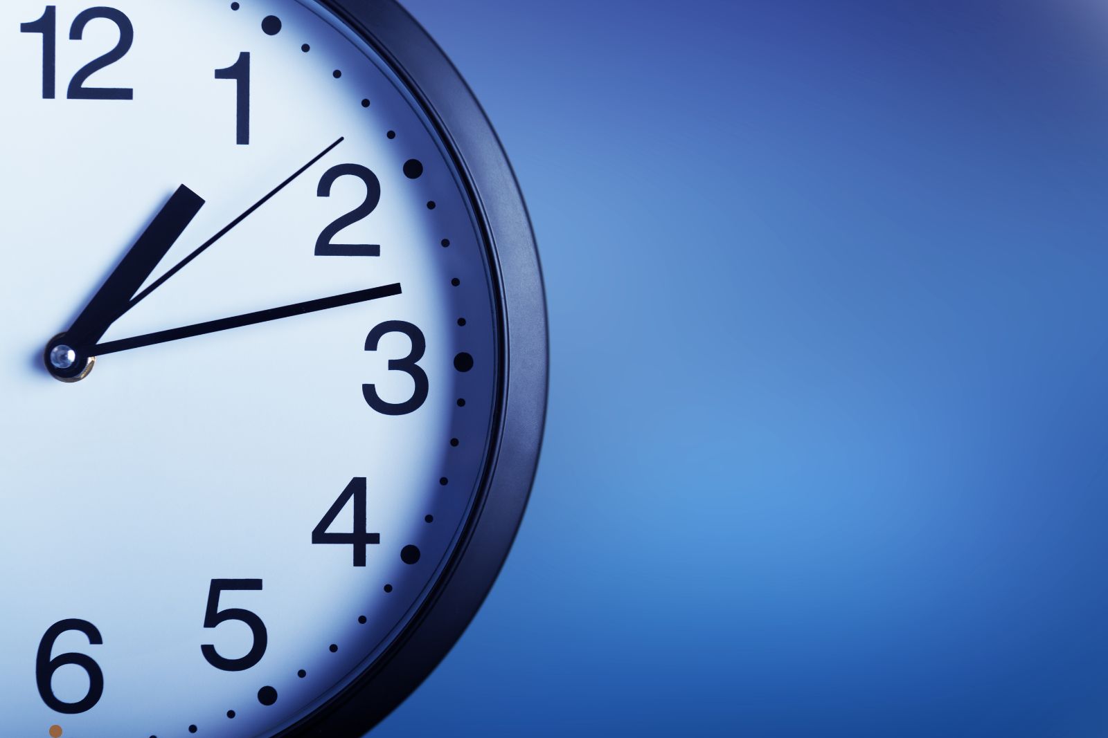 Empty office at night with glowing screens